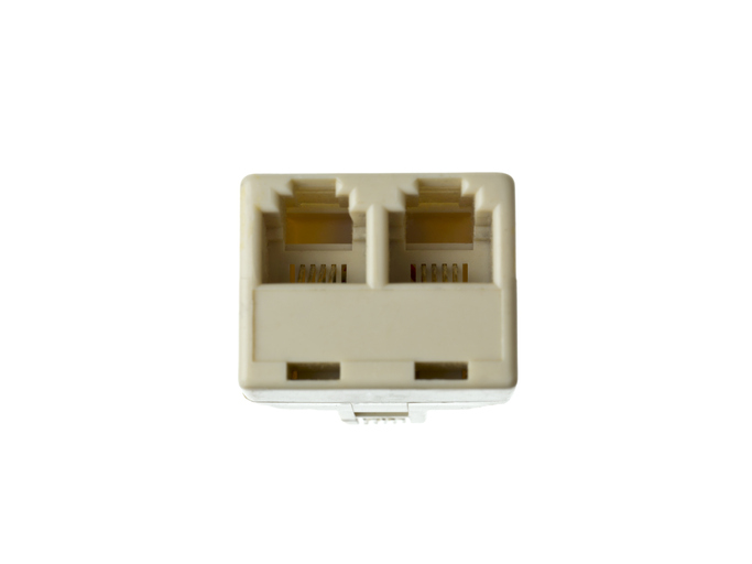 Beige double RJ-11 telephone jack for commercial phone jack installation by Kazar’s Electric, ensuring secure connections.