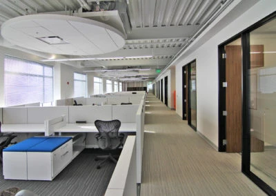 Open office layout with workstations and cubicles at Kazar’s Electric, Inc., designed for productivity and collaboration.